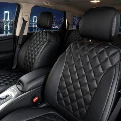 Luxury Line Diamond Stitch Seat Covers installed in a vehicle, featuring black leatherette with a premium quilted diamond pattern and ostrich-style texture.