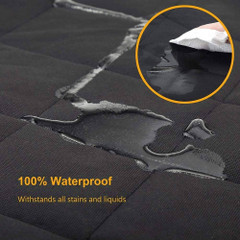 100% waterproof Atomic Pet Seat Cover fabric withstands all stains and liquids, shown with water pooling on the surface.