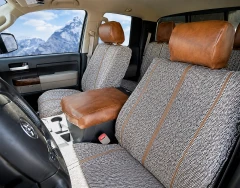 Luxury Line Saddle Blanket Seat Covers installed in a truck, featuring woven inserts with premium brown leatherette.