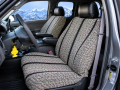 Luxury Line Saddle Blanket Seat Covers installed in a truck interior, featuring woven inserts with black leatherette trim.