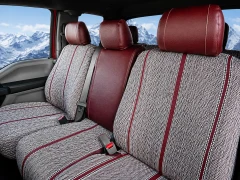 Luxury Line Saddle Blanket Seat Covers in a truck, featuring woven inserts and dark red leatherette accents.