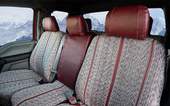 Luxury Line Saddle Blanket Seat Covers in a truck, featuring woven inserts and dark red leatherette accents.