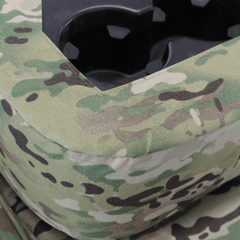 Close-up of MultiCam Seat Covers console cover with precise custom-fit openings for cupholders and storage access.