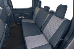 Neoprene Seat Covers installed on rear seats (wide view), two-tone neoprene panels with a tailored fit.