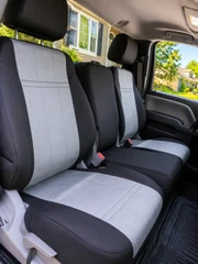 Dodge Waterproof CORDURA seat covers with headrests installed, tough protection for rear passengers and family road trips.