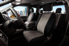 Ford NeoSupreme Seat Covers installed on front seats in a truck, premium two-tone black and gray with a custom fit.