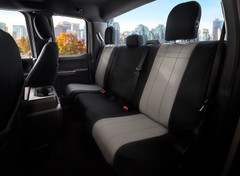 Dodge NeoSupreme Seat Covers installed on a rear truck bench seat, two-tone black and gray with a clean custom fit.