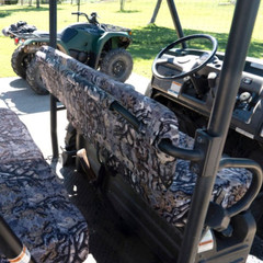 UTV bench seat with a bold dark tribal camo pattern, offering custom-fit protection for off-road adventures.