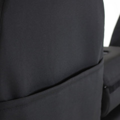 Detailed view of the rear storage pocket on a black Cool-Max Seat Cover, showing the durable tailored finish.