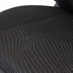 Close-up of the breathable mesh seat cushion on a black Cool-Max Seat Cover, highlighting the textured comfort fabric.