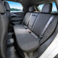 Cool-Max Seat Covers installed on a rear bench seat, featuring breathable fabric and a clean custom-fit finish.