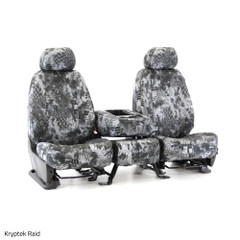 Front bucket seats and center console with Kryptek Raid camo seat covers, offering a custom-fit tactical look.