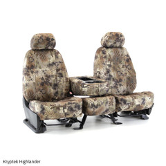 Front bucket seats and center console featuring Kryptek Highlander camo seat covers for durable outdoor protection.
