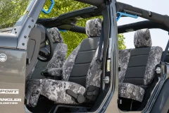 Luxury Line Kryptek Camo Seat Covers shown on front and Rear seats of Jeep Wrangler.
