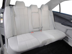 Neoprene Seat Covers installed on a rear bench seat in light gray, tailored fit with headrests and full coverage.