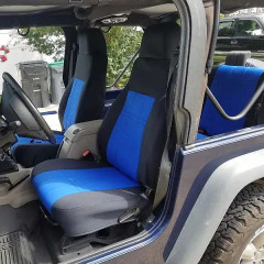 High-back front bucket seats in a Jeep Wrangler outfitted with vibrant blue and black neoprene seat covers, offering a rugged, water-resistant solution for off-road adventures.