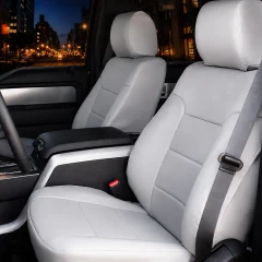 Sof-Touch Leatherette Seat Covers installed on front seats in a truck, smooth leatherette upholstery with a clean custom-fit finish.