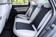 Sof-Touch Leatherette Seat Covers installed on rear seats, quilted black and gray leatherette with a tailored fit and full coverage.