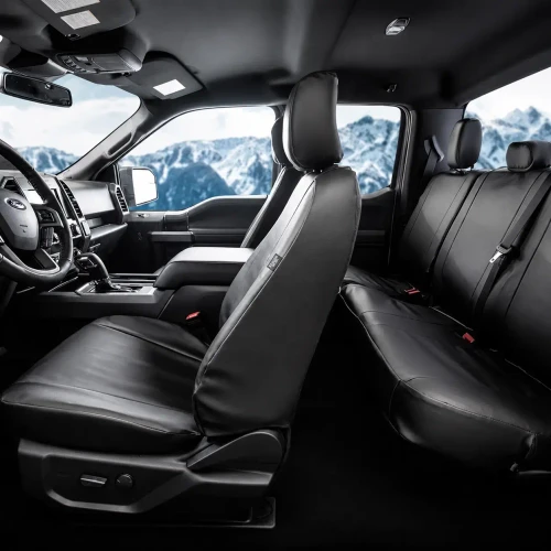 Black Pro-Tect Vinyl Seat Covers installed in a vehicle, heavy-duty vinyl with a tailored fit and full coverage.