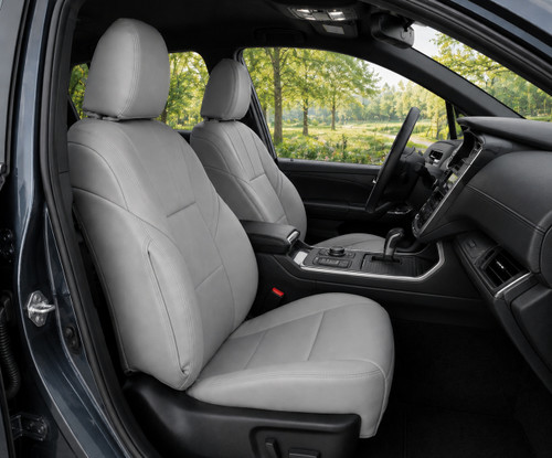 Genuine Leather Seat Covers installed in a vehicle, premium light gray leather upholstery with a clean tailored fit.