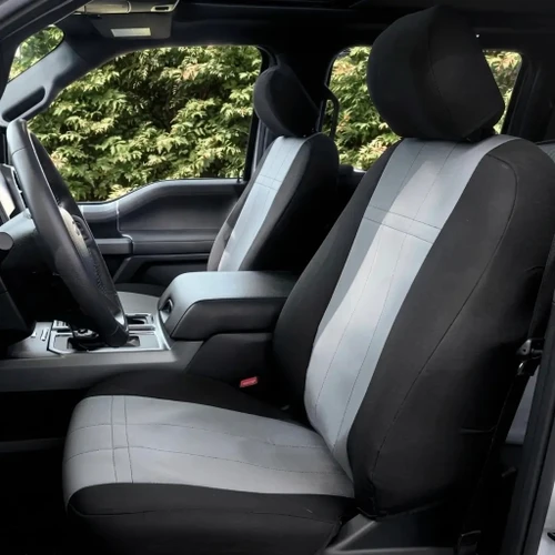 Waterproof Dodge Waterproof CORDURA seat covers on truck front buckets, two-tone black bolsters and light gray stitched center panels.