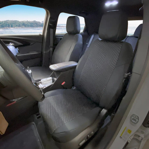 Cool-Max Seat Covers installed on front seats in a vehicle, providing cool comfort with breathable fabric and a custom-fit look.
