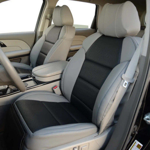 Sof-Touch Leatherette Seat Covers installed in a vehicle, two-tone leatherette with quilted black panels and a tailored fit.