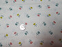 D#1845, C#Q, Makower, off white background with multi colour tulip design, 100% good quality quilt cotton, 42" wide