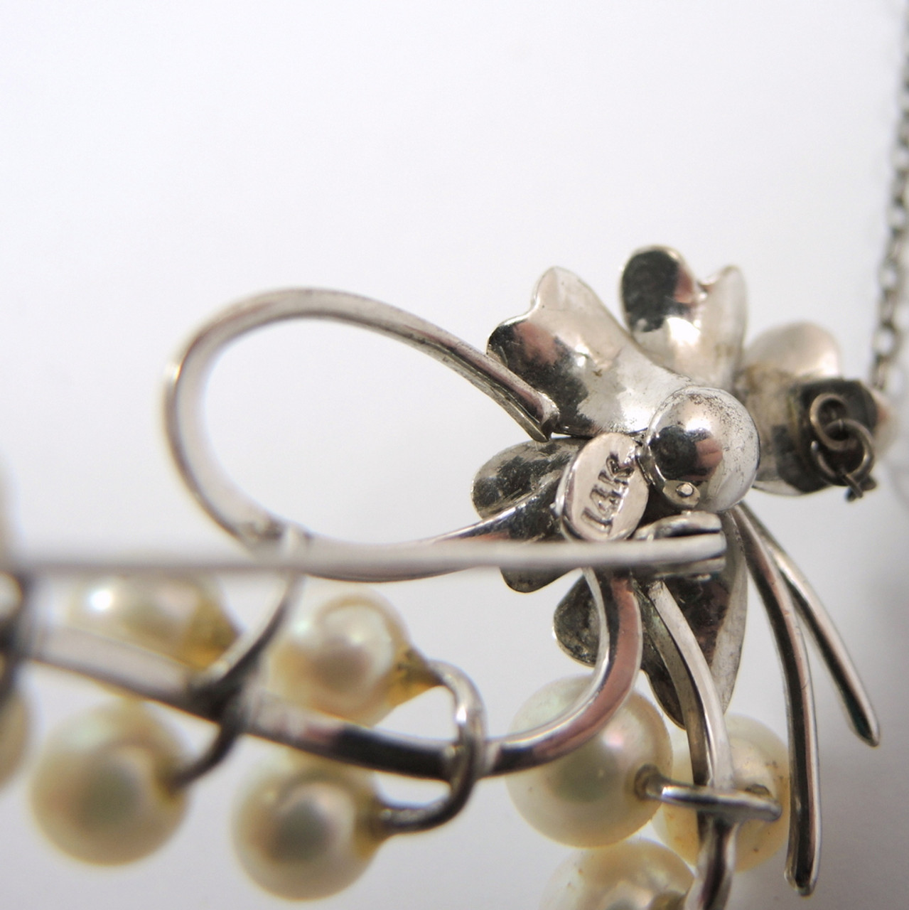 Vintage pearl brooch pins store