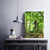 Foamex Mounted Photo Prints, a vibrant outdoor mountain biking scene on a foam board displayed on a rustic wooden desk.