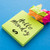 Sticky Notes, bright yellow sticky notes with 'Hello Wednesday' message and colorful crumpled paper beside them on a blue background.