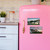 Fridge Photo Magnets, colorful magnets on a pink refrigerator featuring scenic landscape photos.