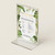 Flyer holder, clear acrylic display stand for promotional flyers with a tropical leaf design on the sign.
