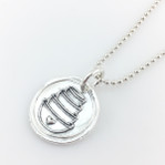 Pyrex Bowl Stack Wax Seal Inspired Necklace on a white background