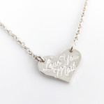 Love You Most Fine Silver Heart hanging from a sterling cable chain, shown on a white background.