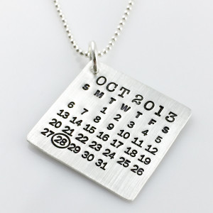 Mark Your Calendar Necklace with oval highlight on white background