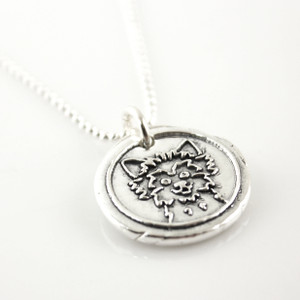 Yorkshire Terrier Wax Seal Inspired Necklace on a white background