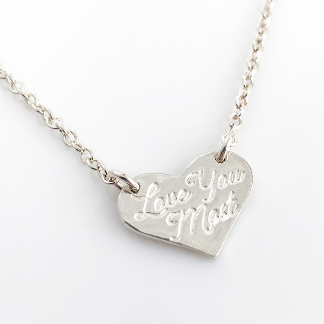 Love You Most Fine Silver Heart hanging from a sterling cable chain, shown on a white background.