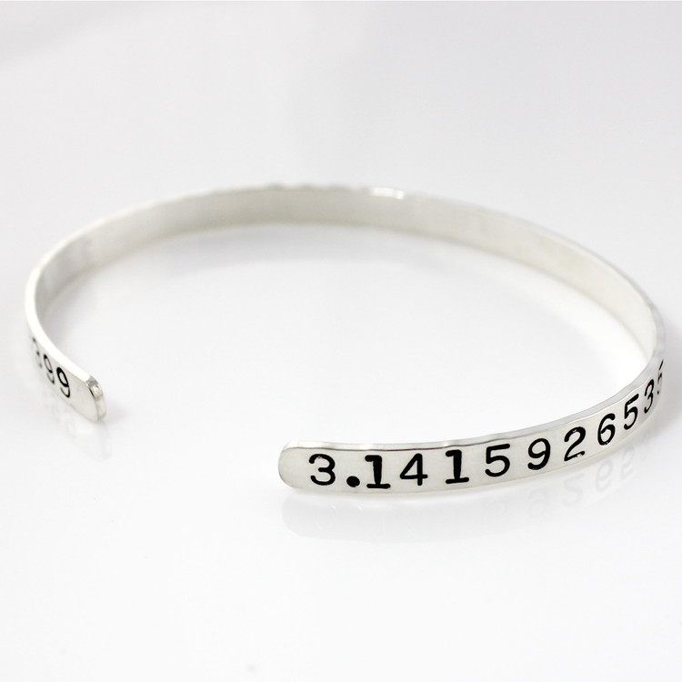 sterling silver Pi Handstamped Cuff Bracelet on a white background