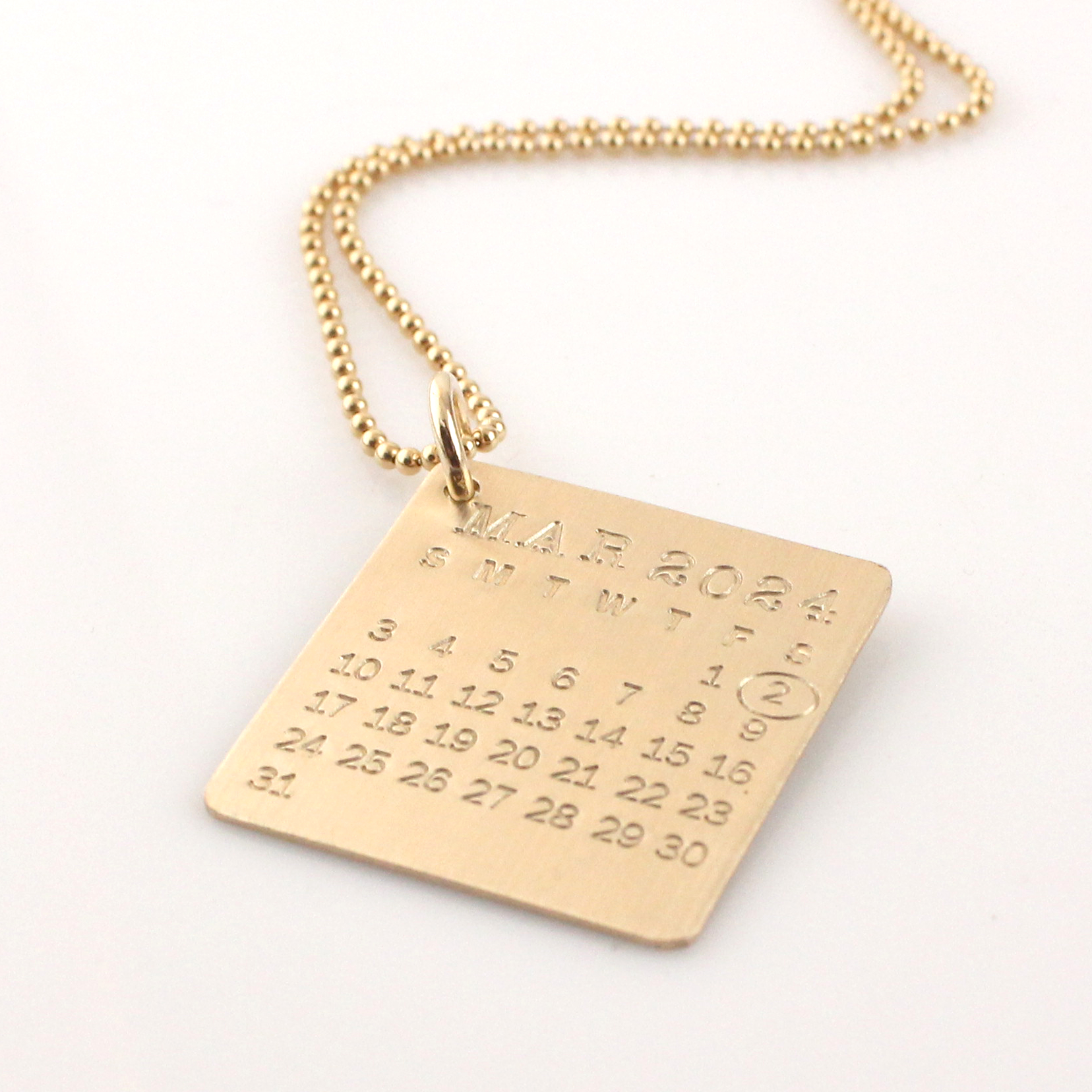 Calendar Necklace