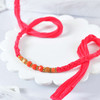 Divine Rudraksh Rakhi with Coral Beads