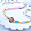 Pastel Multicolor Floral Designer Rakhi