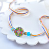 Vibrant Floral Motif Designer Rakhi (Loose)