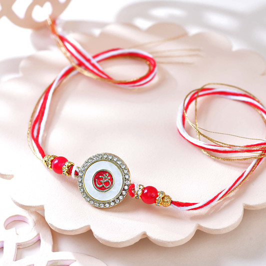 Divine Om Radiance Pearl Rakhi