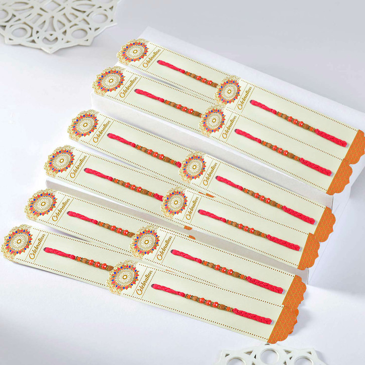 Divine Rudraksh Rakhi with Coral Beads
