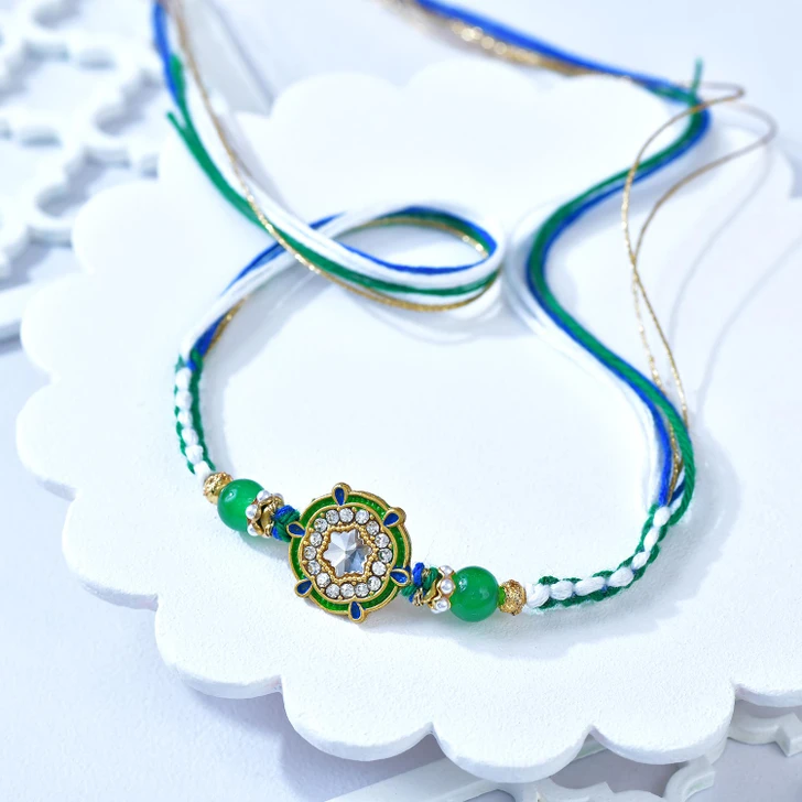 Kavya Rakhi Emerald Spark Designer Rakhi (Loose)