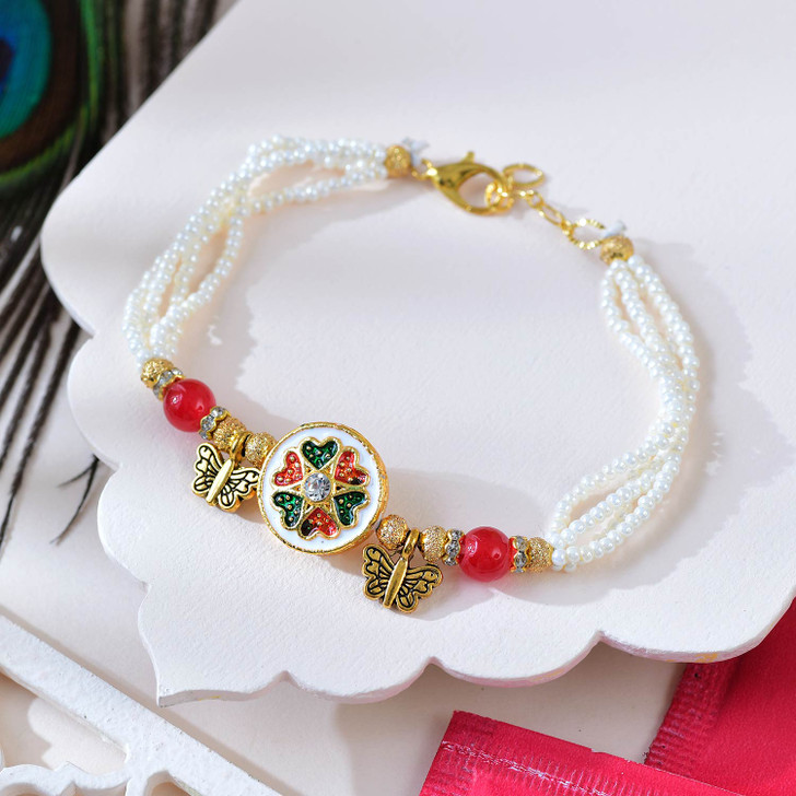 Elegant Floral & Pearl Bhaiya Bhabhi Rakhi Set