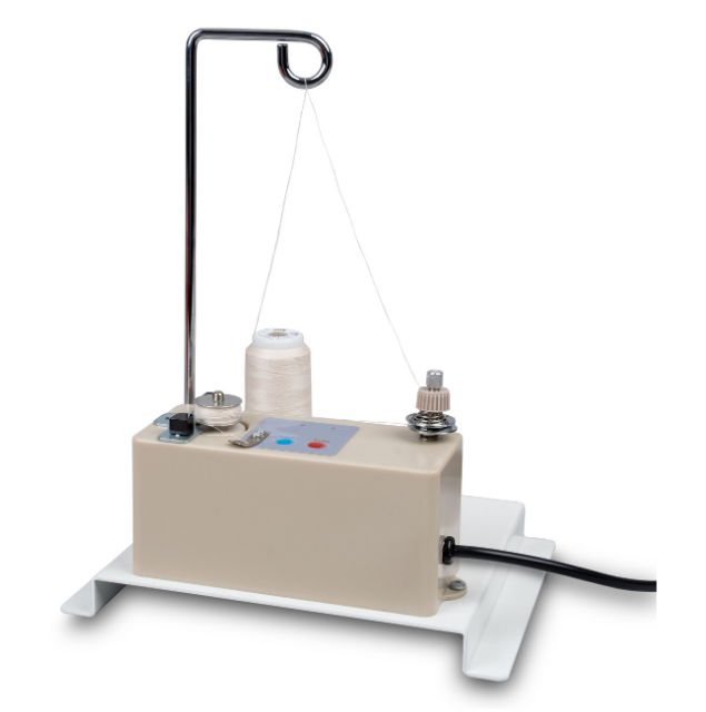 Janome Quilt Maker 18 with Bobbin Winder and 8' Frame Quilt Quarters