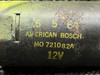 MO721082A (Alt: 475-192) American Bosch Flap Motor Assembly (Volts: 12)