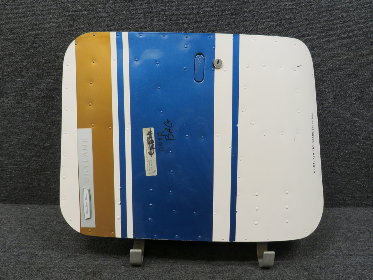 0711629-1 Cessna 182J Baggage Door Striped Assembly